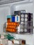 Medications are placed on the shelves of the refrigerator for storage