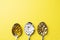 Medications vitamins tablets and pills in spoon. Yellow background. Copy of the space