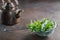 Medicinal herbs in tea infuser and vintage copper tea kettle. Herbal medicine.