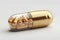 Medicinal opulence 3D gold medical pill, vitamins, isolated on white