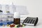 Medicine boxes with pills, medicines and calculator