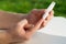 Medicine, diabetes, glycemia, healthcare and people concept - close up of a man`s hands using a lancet on his finger to check