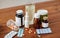 Medicine and drugs on wooden table