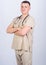 Medicine and health care. Treatment and prevention. Guy experienced doctor beige clothes on white background. Check