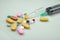 Medicine pills, tablets, syringe and vaccine