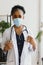 medicine, profession and healthcare concept - african american female doctor or scientist in protective facial mask in