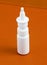 Medicine spray bottle nasal , brown background