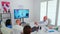 Medicine staff having videoconference of hospital team with expert doctor