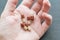 Medicine transparent capsules in woman hand