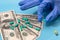 Medicines capsules on dollar