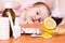 Medicines and vitamins on the table against the background of a child in a bed that has chickenpox
