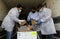 Medics and police officers check a shipment of the Russia`s Sputnik V vaccine for COVID-19 coronavirus disease
