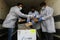 Medics and police officers check a shipment of the Russia`s Sputnik V vaccine for COVID-19 coronavirus disease