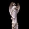 Medieval angel statue isolated on black background