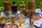 Medieval apothecary`s table with bottles and jars