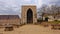 Medieval arch gate to Stavelot abbey on a cloudy day