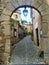 Medieval arch and street  in Tossa de Mar, Spain