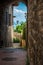 Medieval arched street in the old town of San Gimignano in Tuscany, Italy