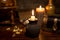 Medieval background with candles, a vintage wooden box, gold and