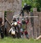 Medieval battle headshot attacking castle