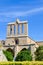 Medieval Bellapais Abbey in Turkish Northern Cyprus captured on vertical picture with blue sky. Beautiful historical site