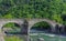 The medieval  bridge of Echallod in Arnad,  over the river  dora baltea in Aosta Valley/Italy