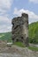 Medieval broken tower. Archaeological site on the Olt valley in Carpathian Mountains