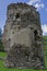 Medieval broken tower. The custom-house on Olt river in Carpathian mountains.