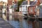 Medieval building facades on river canals in old town Brugge Bruges, Belgium. Vintage houses with wooden door and windows.