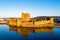 Medieval castle in Carrickfergus near Belfast at sunrise