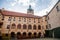 Medieval castle Melnik in sunny autumn day, Courtyard with Renaissance arcades, High clock tower of the Church of Saints Peter and