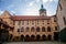 Medieval castle Melnik in sunny autumn day, Courtyard with Renaissance arcades, High clock tower of the Church of Saints Peter and