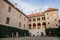 Medieval castle Melnik in sunny autumn day, Courtyard with Renaissance arcades, Old sundial and sgraffito mural decorated plaster