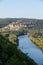 The medieval Chateau de Beynac rising on a limestone cliff above the Dordogne River seen from Castelnaud. France