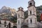 Medieval church with towers in Kotor Montenegro in mountains.