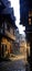 Medieval city street, alley. transparent background PNG. Dark medieval city at night with lights dimly lighting the streets.