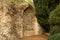 Medieval flint stone arch alcove in medieval stone wall