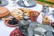 Medieval food table with biscuits fruits and pickle