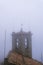 Medieval fortification in dramatic mystic fog, cloud. travel to San Marino, first tower: la Rocca or Guaita, Republic in Italy,