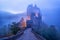 The medieval gothic Burg Eltz castle in the morning mist, Germany