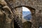 Medieval gothic castle Frydstejn in sunny day, romantic ruins of popular stronghold with massive guard walls near Mala Skala,