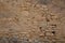Medieval high old weathered handcrafted stone wall background