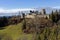 Medieval hilltop castle full view, early spring landscape