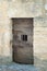 Medieval Jail door on an ancient fortress  in village MÃ©nerbes in Provence France