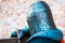 Medieval knight in armor. Head. Helmet. The historical restoration of military events