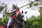 A medieval knight prepare to fight during jousting tournament