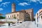 Medieval landmark in Caldes de Montbui, Holy Saint Mary Church against a blue Sky in Barcelona, Spain. Empty copy space