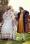 Medieval, lawn and couple in history with renaissance fashion outdoor with marriage and love. Vintage, king and royal