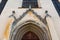 Medieval lutheran church entrance, brick pylons, hand carved oak door.