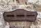 Medieval mailbox with inscriptions  `Letters`, `Express` and `Press` on the sandstone wall in Italy